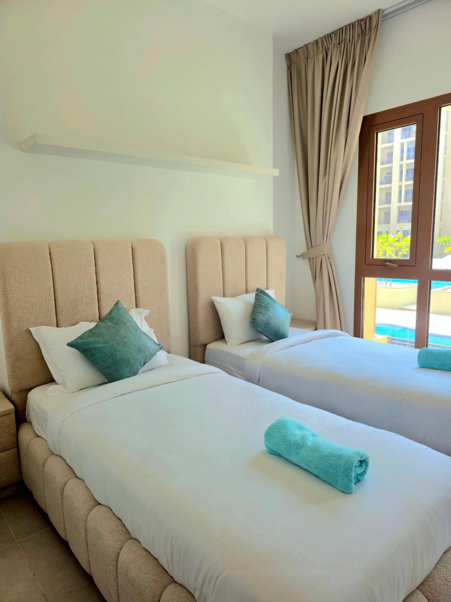 Bareez Bliss Retreat Elegant 2br With Balcony, Pool & Park View