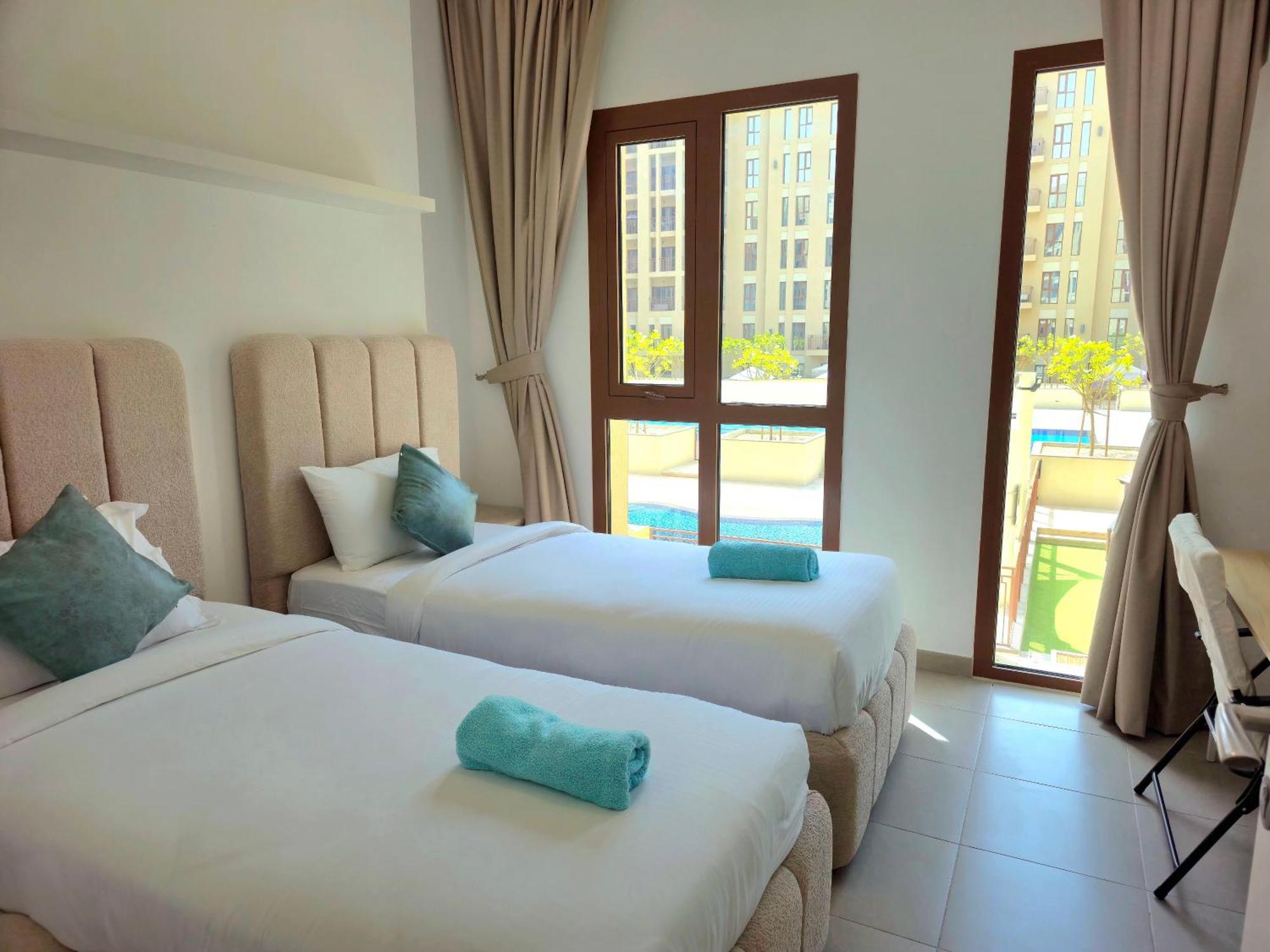 Bareez Bliss Retreat Elegant 2br With Balcony, Pool & Park View Dubai
